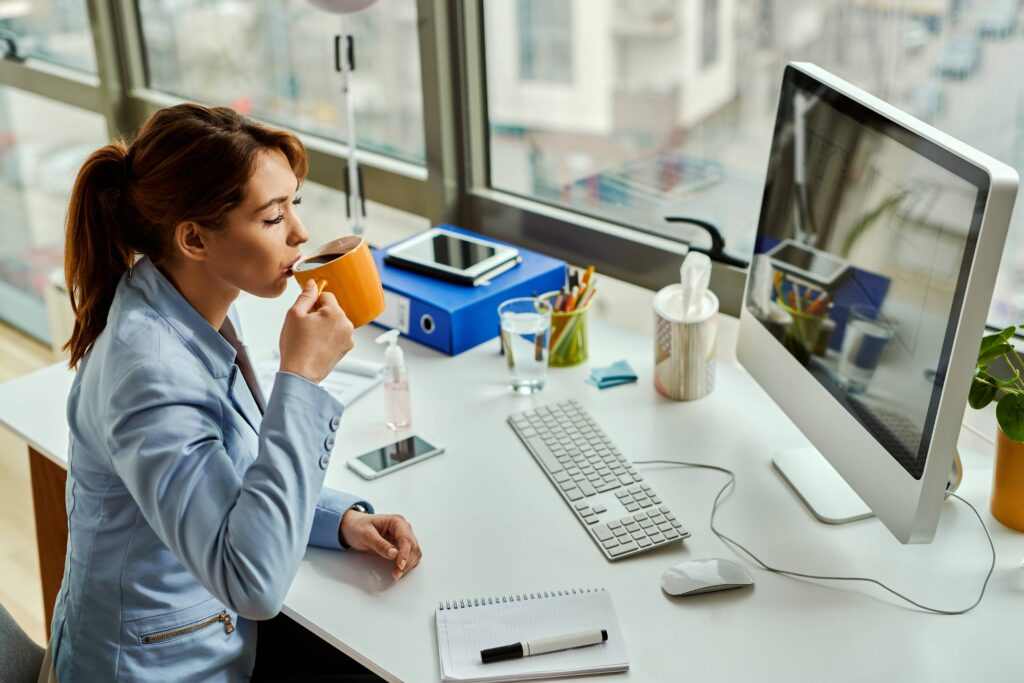 Person taking a five-minute mental wellness break during a busy day.