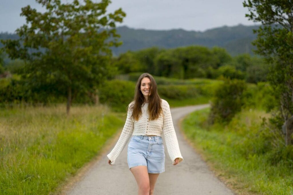 Person taking a relaxing walk to recharge mentally after a stressful week.