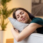 Peaceful person sleeping comfortably while the brain restores itself overnight for better mental health