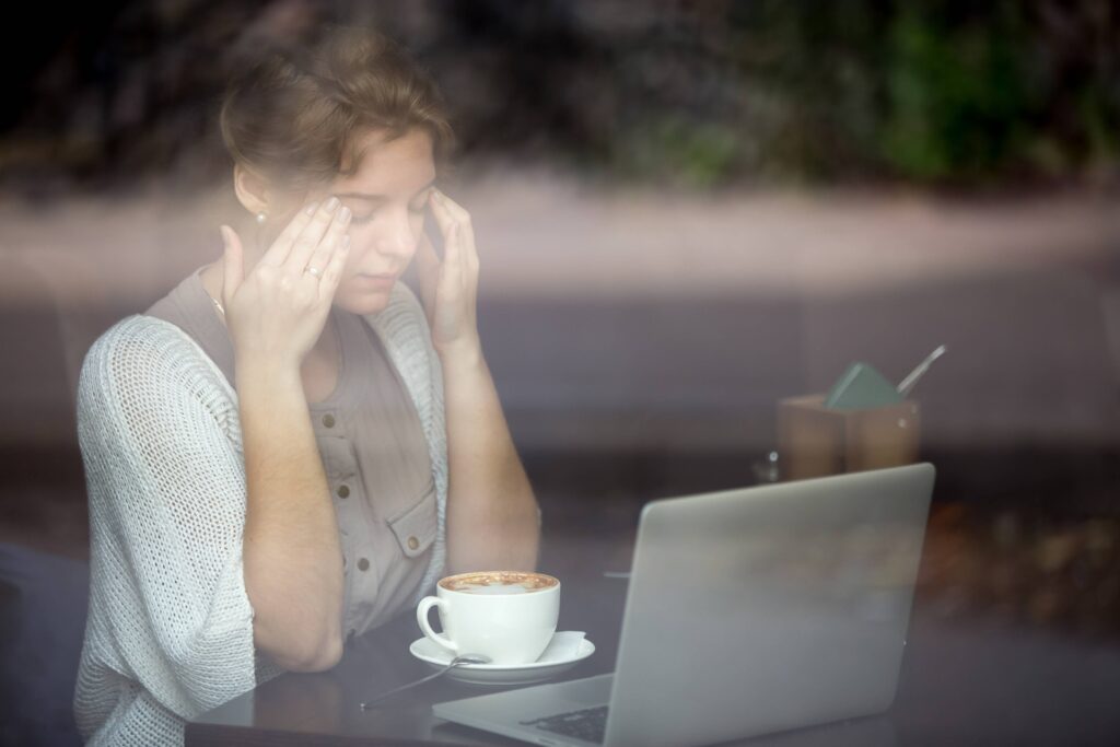 Professional feeling overwhelmed by minor daily setbacks while experiencing emotional exhaustion