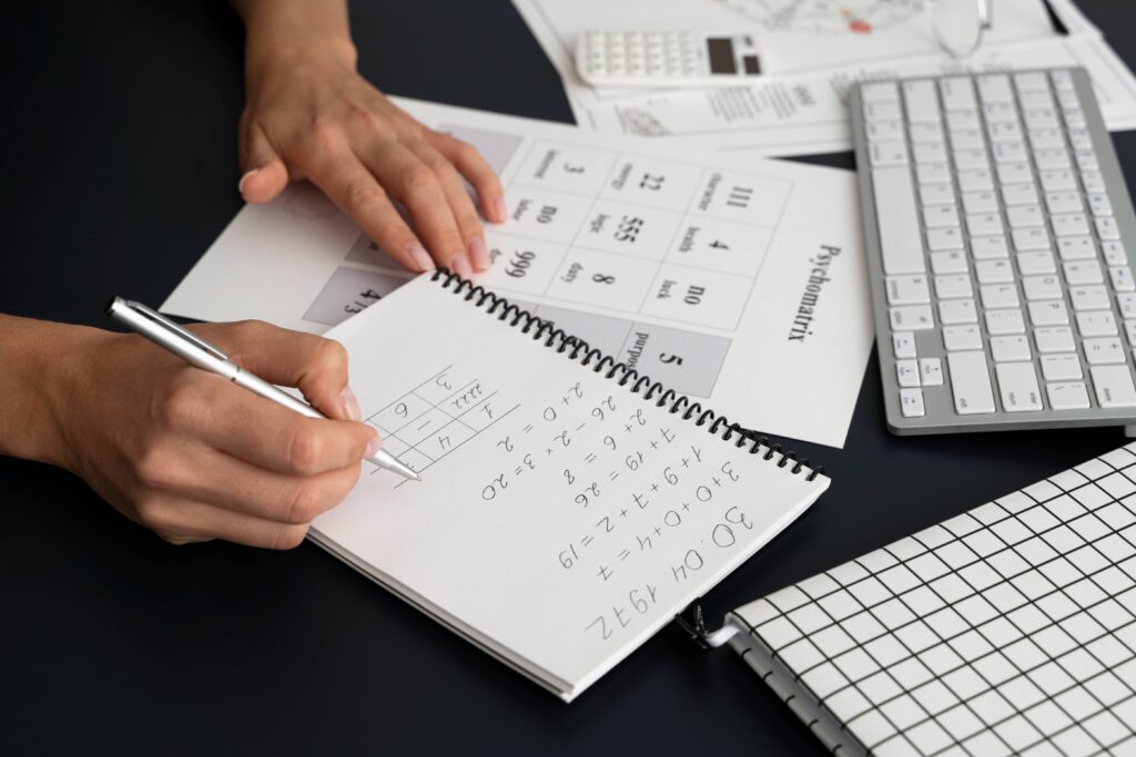 Notebook showing one large task divided into several small, achievable action steps