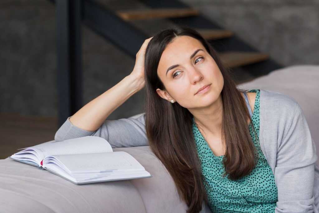 Person looking worried while facing a small everyday problem that appears much larger due to stress